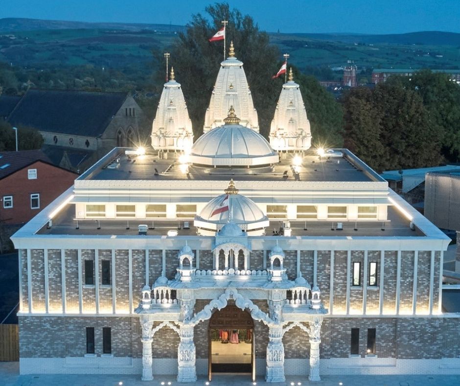Drone shot of Shree Swaminarayan Temple lit up 